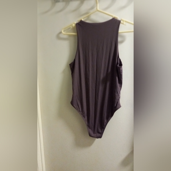Purple stretchy bodysuit can also be worn as a bathing suit - Picture 3 of 3